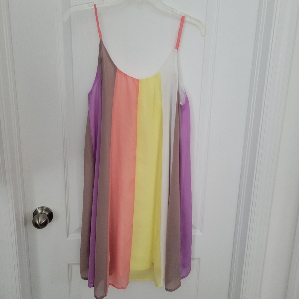 She + Sky multicolored striped dress features a chiffon-style fabric and spaghet